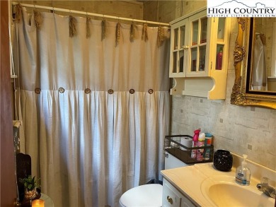 Located in the highly sought-after Linville Land Harbor, this on Land Harbor Golf Course in North Carolina - for sale on GolfHomes.com, golf home, golf lot