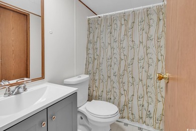 In this well-manicured and gated community of The Parks at Long on Long Bay Club in South Carolina - for sale on GolfHomes.com, golf home, golf lot