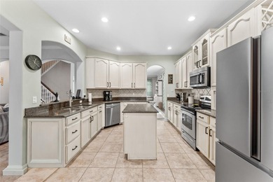 Welcome to refined living in North Shore at Lake Hart -- where on North Shore Golf Club in Florida - for sale on GolfHomes.com, golf home, golf lot