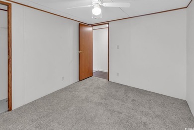 In this well-manicured and gated community of The Parks at Long on Long Bay Club in South Carolina - for sale on GolfHomes.com, golf home, golf lot