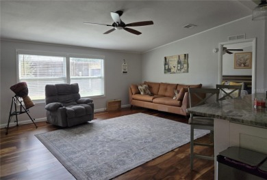 2-BEDROOM 2 BATH home, beautifully remodeled home with bonus on Zellwood Station Country Club in Florida - for sale on GolfHomes.com, golf home, golf lot