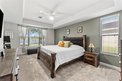 Welcome to refined living in North Shore at Lake Hart -- where on North Shore Golf Club in Florida - for sale on GolfHomes.com, golf home, golf lot