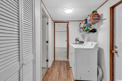 In this well-manicured and gated community of The Parks at Long on Long Bay Club in South Carolina - for sale on GolfHomes.com, golf home, golf lot