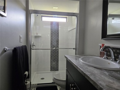 2-BEDROOM 2 BATH home, beautifully remodeled home with bonus on Zellwood Station Country Club in Florida - for sale on GolfHomes.com, golf home, golf lot