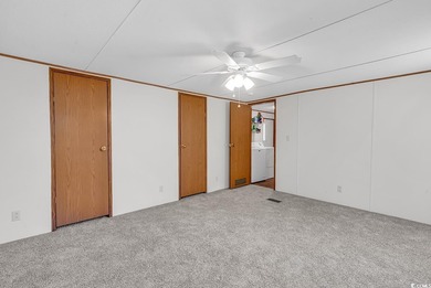 In this well-manicured and gated community of The Parks at Long on Long Bay Club in South Carolina - for sale on GolfHomes.com, golf home, golf lot