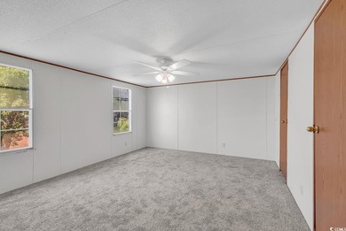 In this well-manicured and gated community of The Parks at Long on Long Bay Club in South Carolina - for sale on GolfHomes.com, golf home, golf lot