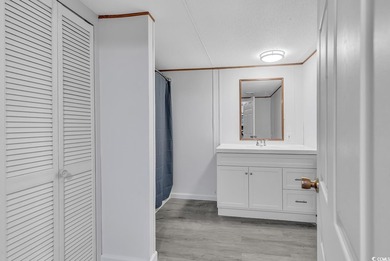 In this well-manicured and gated community of The Parks at Long on Long Bay Club in South Carolina - for sale on GolfHomes.com, golf home, golf lot