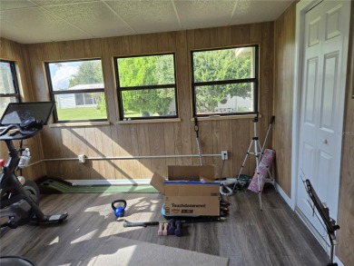 2-BEDROOM 2 BATH home, beautifully remodeled home with bonus on Zellwood Station Country Club in Florida - for sale on GolfHomes.com, golf home, golf lot