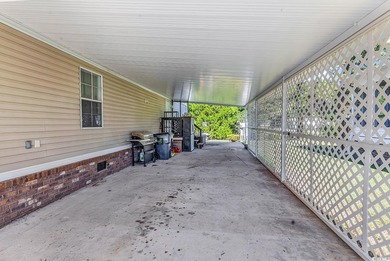 In this well-manicured and gated community of The Parks at Long on Long Bay Club in South Carolina - for sale on GolfHomes.com, golf home, golf lot