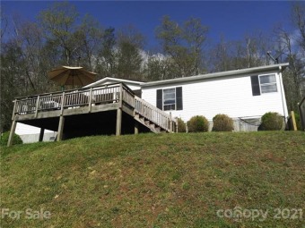 Home and 2 acres located in the western North Carolina Mtns. 20 on Mt. Mitchell Golf Course in North Carolina - for sale on GolfHomes.com, golf home, golf lot