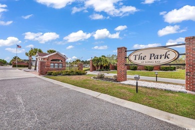 In this well-manicured and gated community of The Parks at Long on Long Bay Club in South Carolina - for sale on GolfHomes.com, golf home, golf lot