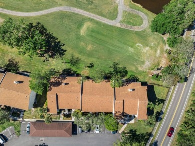Stunning 2-Bed, 2-Bath Condo Overlooking Feather Sound Golf on Feather Sound Country Club in Florida - for sale on GolfHomes.com, golf home, golf lot