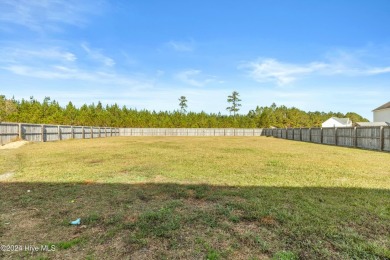 Welcome home to this stunning 5-bedroom, 4.5-bathroom gem in the on Bear Trail Golf Club in North Carolina - for sale on GolfHomes.com, golf home, golf lot