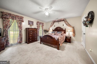Welcome to your own private sanctuary in the heart of Newnan on Canongate On White Oak Golf Course in Georgia - for sale on GolfHomes.com, golf home, golf lot