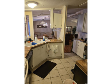 Located on a spacious corner lot, this home features a fenced on Prestwick Country Club in South Carolina - for sale on GolfHomes.com, golf home, golf lot