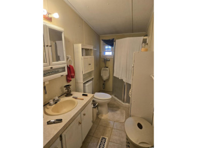 Located on a spacious corner lot, this home features a fenced on Prestwick Country Club in South Carolina - for sale on GolfHomes.com, golf home, golf lot