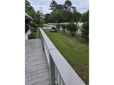Located on a spacious corner lot, this home features a fenced on Prestwick Country Club in South Carolina - for sale on GolfHomes.com, golf home, golf lot