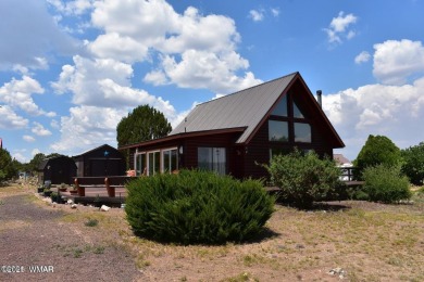 This beautiful Mountain Cabin in White Mountain Lakes has much on Silver Creek Golf Club in Arizona - for sale on GolfHomes.com, golf home, golf lot