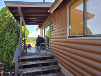 This beautiful Mountain Cabin in White Mountain Lakes has much on Silver Creek Golf Club in Arizona - for sale on GolfHomes.com, golf home, golf lot