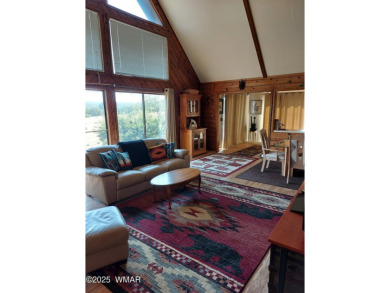 This beautiful Mountain Cabin in White Mountain Lakes has much on Silver Creek Golf Club in Arizona - for sale on GolfHomes.com, golf home, golf lot