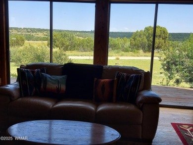 This beautiful Mountain Cabin in White Mountain Lakes has much on Silver Creek Golf Club in Arizona - for sale on GolfHomes.com, golf home, golf lot