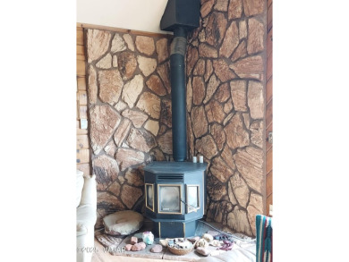 This beautiful Mountain Cabin in White Mountain Lakes has much on Silver Creek Golf Club in Arizona - for sale on GolfHomes.com, golf home, golf lot