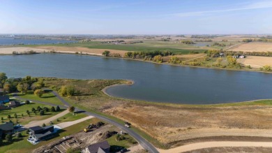 Nearly one acre lot with over 100 feet of Shoreline on Lake Alber on Lake Region Golf Course in South Dakota - for sale on GolfHomes.com, golf home, golf lot