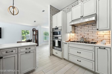Completely Remodeled Pool Home located on a spacious .51 acre on Cimarrone Golf and Country Club in Florida - for sale on GolfHomes.com, golf home, golf lot