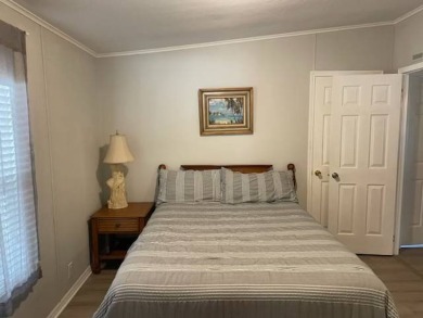 TIRED OF SNOW,ICE AND COLD, TRADE IT IN FOR SUN,WARM AND WHITE on Del Tura Golf and Country Club in Florida - for sale on GolfHomes.com, golf home, golf lot