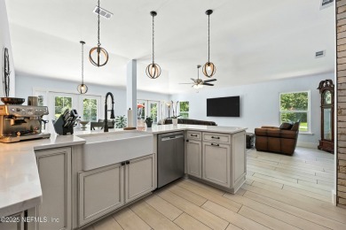 Completely Remodeled Pool Home located on a spacious .51 acre on Cimarrone Golf and Country Club in Florida - for sale on GolfHomes.com, golf home, golf lot