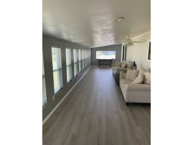 TIRED OF SNOW,ICE AND COLD, TRADE IT IN FOR SUN,WARM AND WHITE on Del Tura Golf and Country Club in Florida - for sale on GolfHomes.com, golf home, golf lot