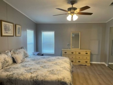 TIRED OF SNOW,ICE AND COLD, TRADE IT IN FOR SUN,WARM AND WHITE on Del Tura Golf and Country Club in Florida - for sale on GolfHomes.com, golf home, golf lot