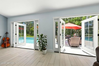 Completely Remodeled Pool Home located on a spacious .51 acre on Cimarrone Golf and Country Club in Florida - for sale on GolfHomes.com, golf home, golf lot