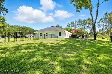 Completely Remodeled Pool Home located on a spacious .51 acre on Cimarrone Golf and Country Club in Florida - for sale on GolfHomes.com, golf home, golf lot