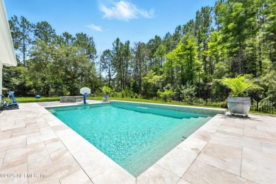 Completely Remodeled Pool Home located on a spacious .51 acre on Cimarrone Golf and Country Club in Florida - for sale on GolfHomes.com, golf home, golf lot