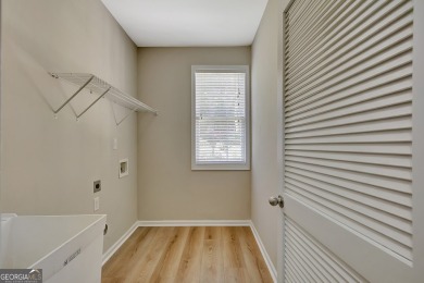 Welcome to this stunning home in the highly sought-after on Braelinn Golf Club in Georgia - for sale on GolfHomes.com, golf home, golf lot
