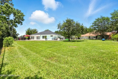 Completely Remodeled Pool Home located on a spacious .51 acre on Cimarrone Golf and Country Club in Florida - for sale on GolfHomes.com, golf home, golf lot