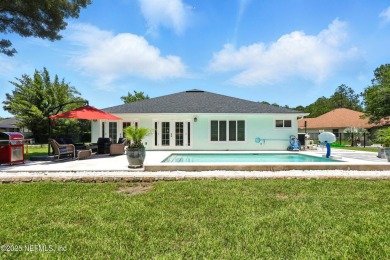 Completely Remodeled Pool Home located on a spacious .51 acre on Cimarrone Golf and Country Club in Florida - for sale on GolfHomes.com, golf home, golf lot