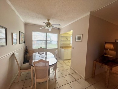 ***CORNER CONDO*** WELL MAINTAINED FIRST FLOOR,  2 BEDROOM, 1.5 on Hillsboro Pines Golf in Florida - for sale on GolfHomes.com, golf home, golf lot