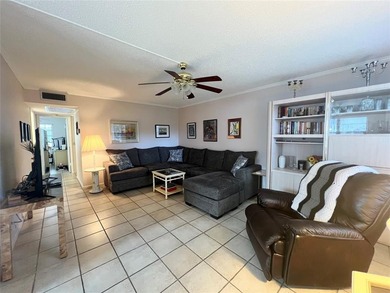 ***CORNER CONDO*** WELL MAINTAINED FIRST FLOOR,  2 BEDROOM, 1.5 on Hillsboro Pines Golf in Florida - for sale on GolfHomes.com, golf home, golf lot