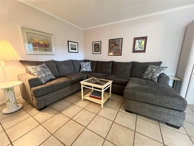 ***CORNER CONDO*** WELL MAINTAINED FIRST FLOOR,  2 BEDROOM, 1.5 on Hillsboro Pines Golf in Florida - for sale on GolfHomes.com, golf home, golf lot