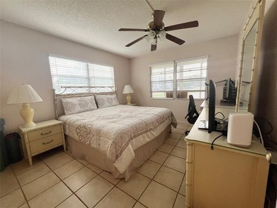 ***CORNER CONDO*** WELL MAINTAINED FIRST FLOOR,  2 BEDROOM, 1.5 on Hillsboro Pines Golf in Florida - for sale on GolfHomes.com, golf home, golf lot