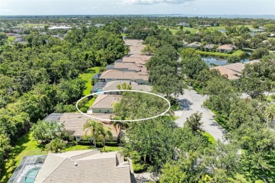 One or more photo(s) has been virtually staged. DARLING HOME! on IMG Academies Golf and Country Club in Florida - for sale on GolfHomes.com, golf home, golf lot