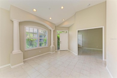 One or more photo(s) has been virtually staged. DARLING HOME! on IMG Academies Golf and Country Club in Florida - for sale on GolfHomes.com, golf home, golf lot