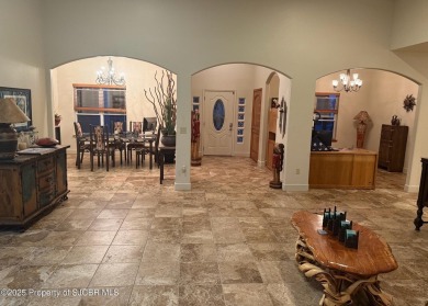 Quality home on the 11th fairway featuring 12 foot ceilings, gas on San Juan Country Club in New Mexico - for sale on GolfHomes.com, golf home, golf lot