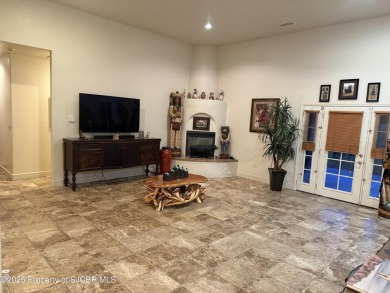 Quality home on the 11th fairway featuring 12 foot ceilings, gas on San Juan Country Club in New Mexico - for sale on GolfHomes.com, golf home, golf lot