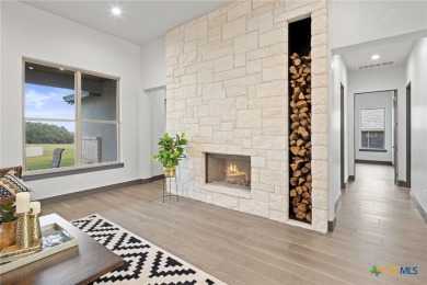 Experience refined living in this beautifully built 2022 home on Apple Rock Golf Course - Horseshoe Bay in Texas - for sale on GolfHomes.com, golf home, golf lot