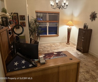 Quality home on the 11th fairway featuring 12 foot ceilings, gas on San Juan Country Club in New Mexico - for sale on GolfHomes.com, golf home, golf lot
