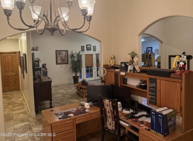 Quality home on the 11th fairway featuring 12 foot ceilings, gas on San Juan Country Club in New Mexico - for sale on GolfHomes.com, golf home, golf lot