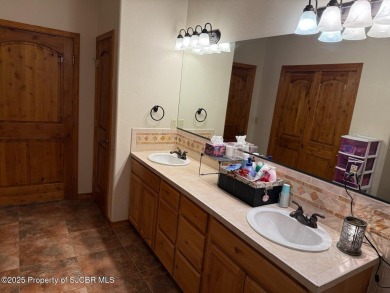 Quality home on the 11th fairway featuring 12 foot ceilings, gas on San Juan Country Club in New Mexico - for sale on GolfHomes.com, golf home, golf lot